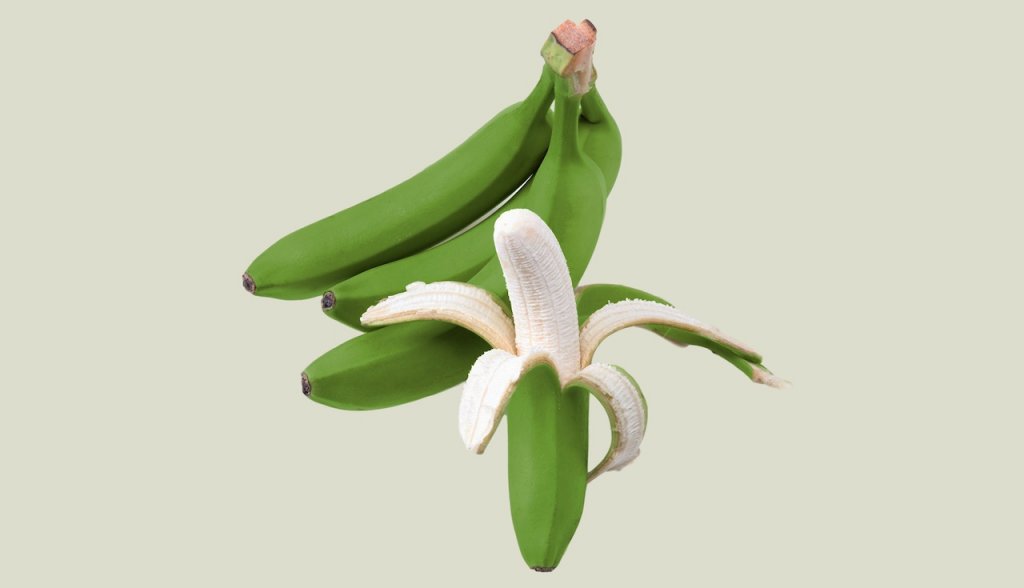 An image of green unripe bananas