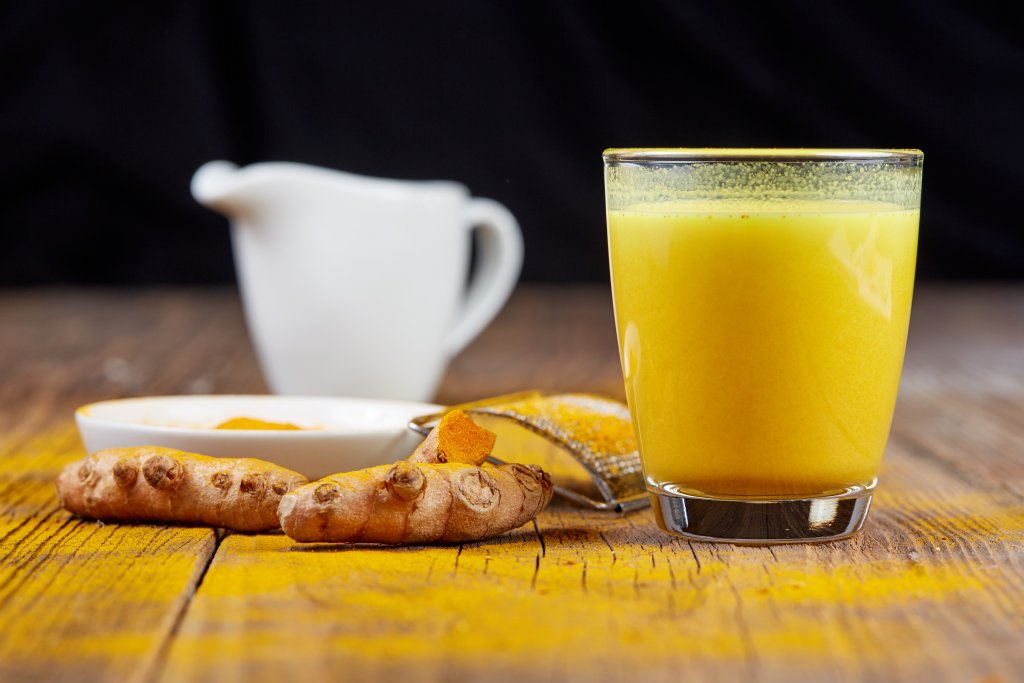 A picture of tea in a yellow mug with ginger