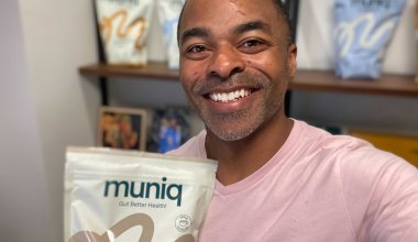 Muniq Founder and CEO Marc Washington holding a bag of Muniq